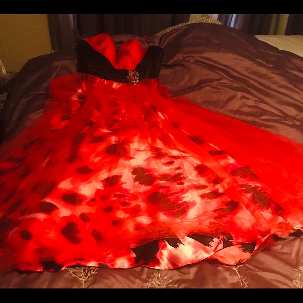 Designer made gown flair with tule.